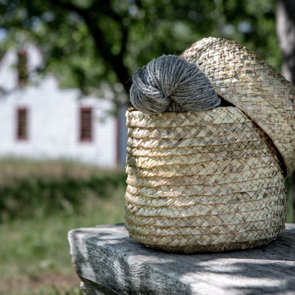 A skein of wool, wound by Madame Robichaud and set into Madame Babineau’s handmade straw basket